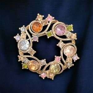 Brooch/Monet Gold Tone Wreath With Multi-colored Stones.